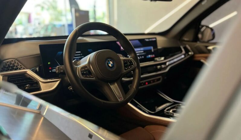 
								BMW X5 cheio									