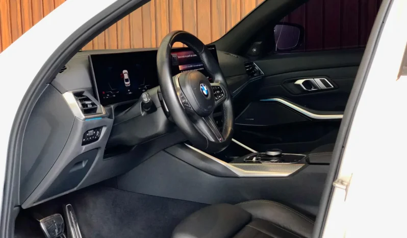 
								BMW 320i cheio									