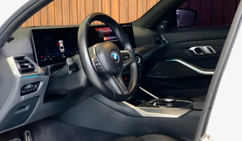 
								BMW 320i cheio									