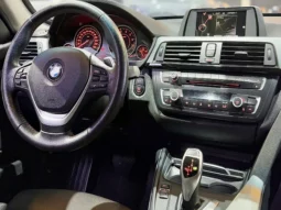 
										BMW 320i cheio									