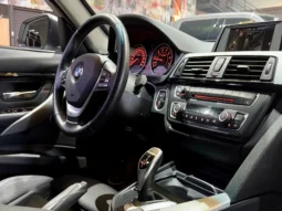 
										BMW 320i cheio									
