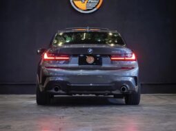 
										BMW 330i cheio									