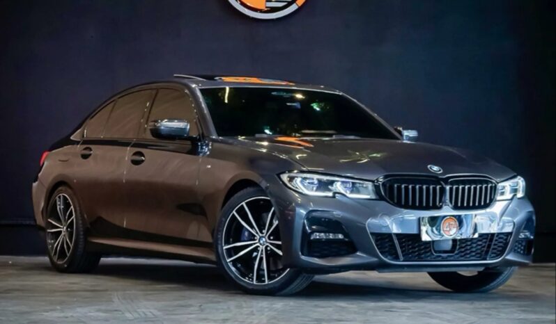 
								BMW 330i cheio									