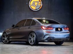 
										BMW 330i cheio									