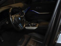 
										BMW 330i cheio									