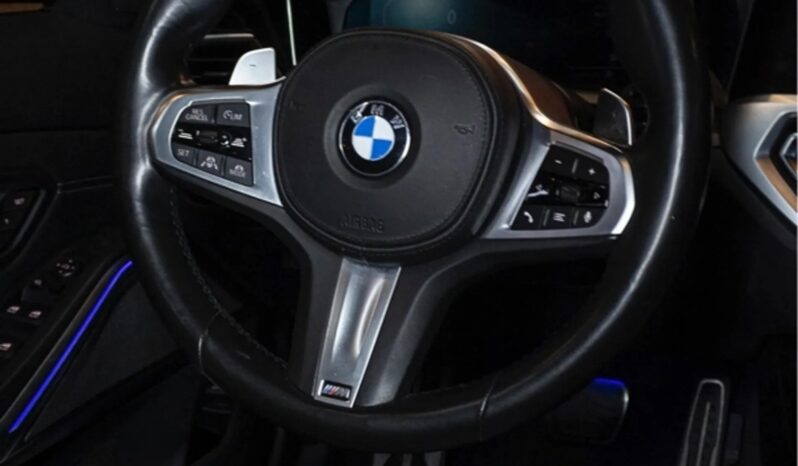 
								BMW 330i cheio									