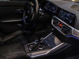 
										BMW 330i cheio									