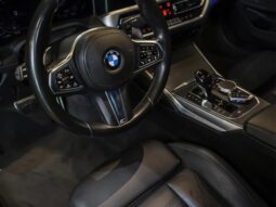 
										BMW 330i cheio									