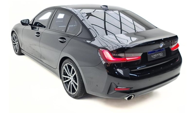
								BMW 320i cheio									