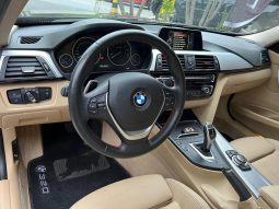 
										BMW 320i cheio									