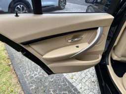 
										BMW 320i cheio									