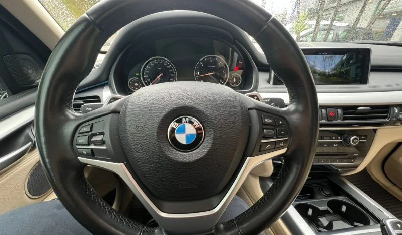 
								BMW X5 cheio									