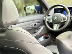 
										BMW 320i cheio									
