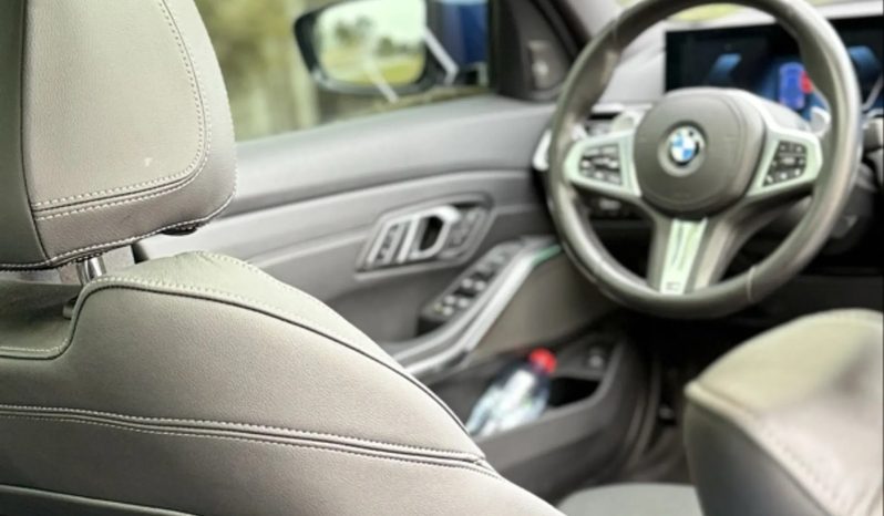 
								BMW 320i cheio									