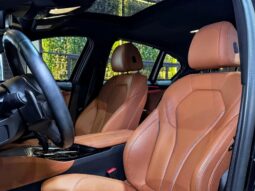 
										BMW 530e cheio									
