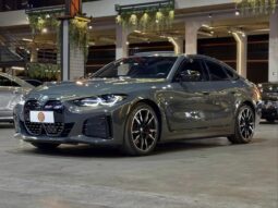 
										BMW I4 cheio									