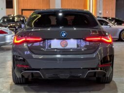 
										BMW I4 cheio									