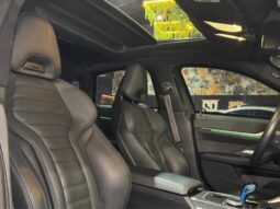 
										BMW I4 cheio									