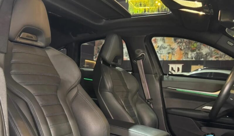
								BMW I4 cheio									