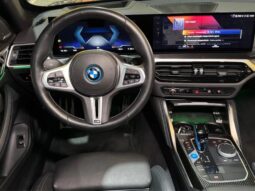 
										BMW I4 cheio									