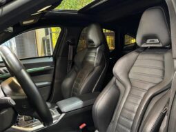 
										BMW I4 cheio									
