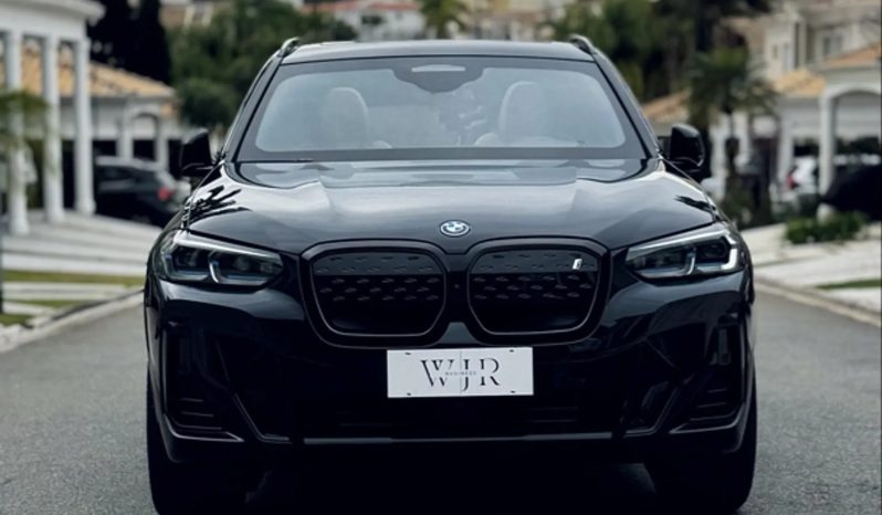 
								BMW iX3 cheio									