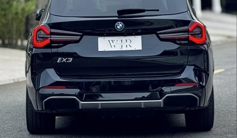
								BMW iX3 cheio									