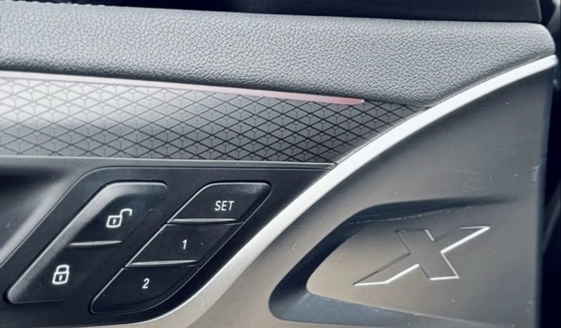 
								BMW iX3 cheio									