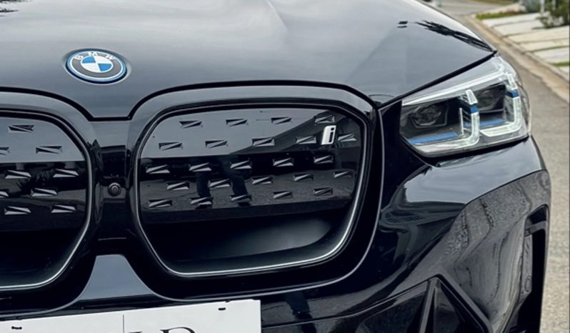 
								BMW iX3 cheio									
