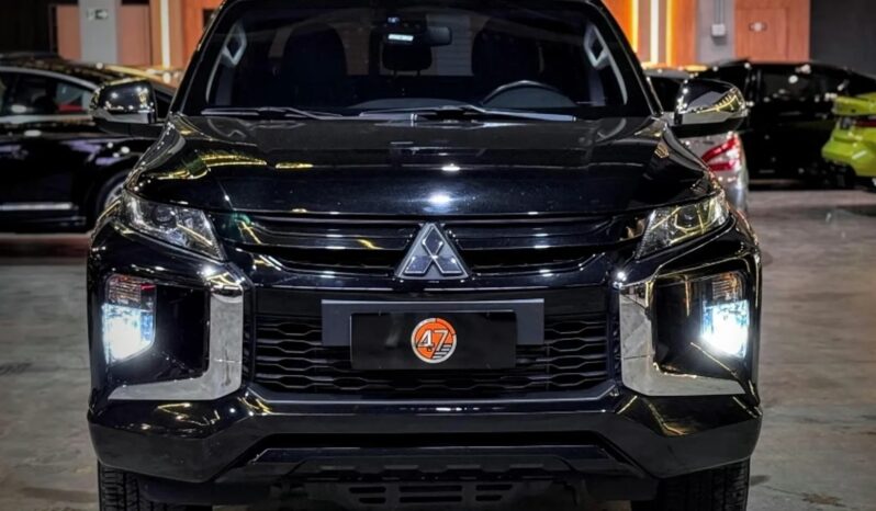 
								MITSUBISHI L200 TRITON cheio									