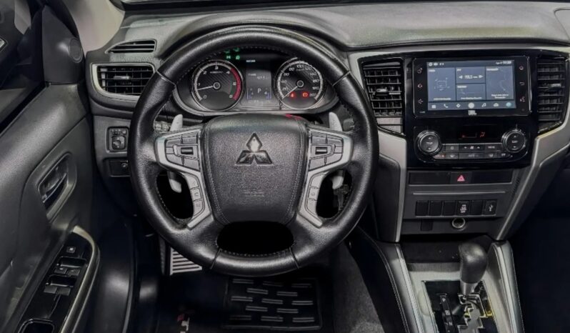 
								MITSUBISHI L200 TRITON cheio									