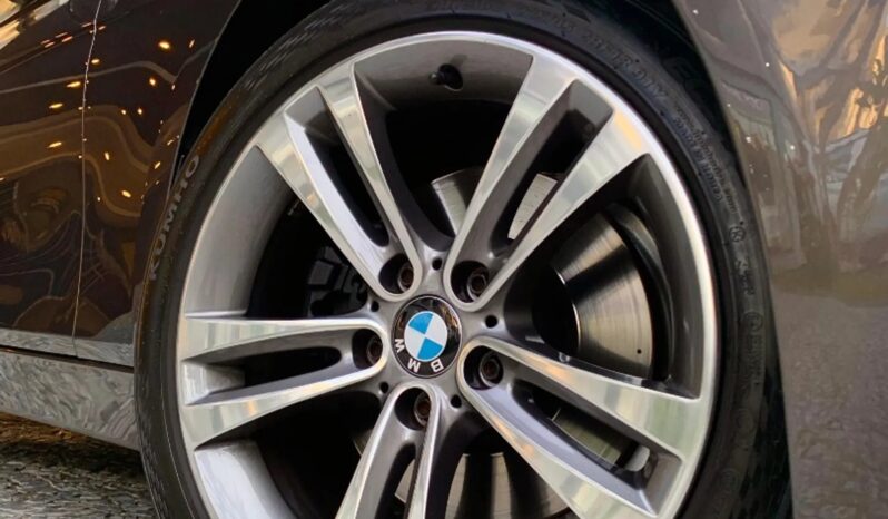 
								BMW 328i cheio									
