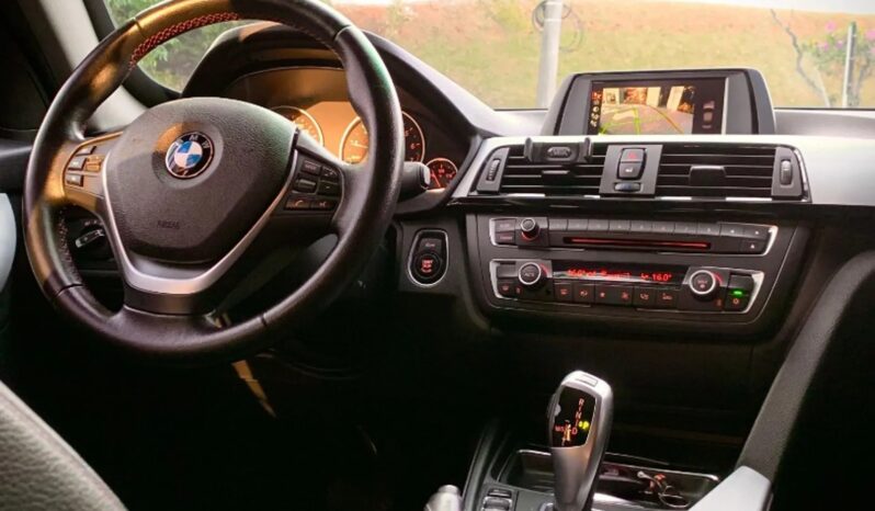 
								BMW 328i cheio									
