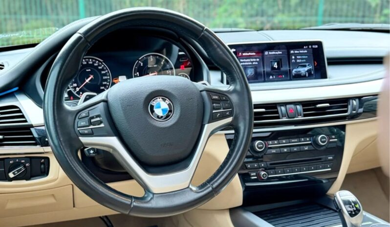 
								BMW X5 cheio									
